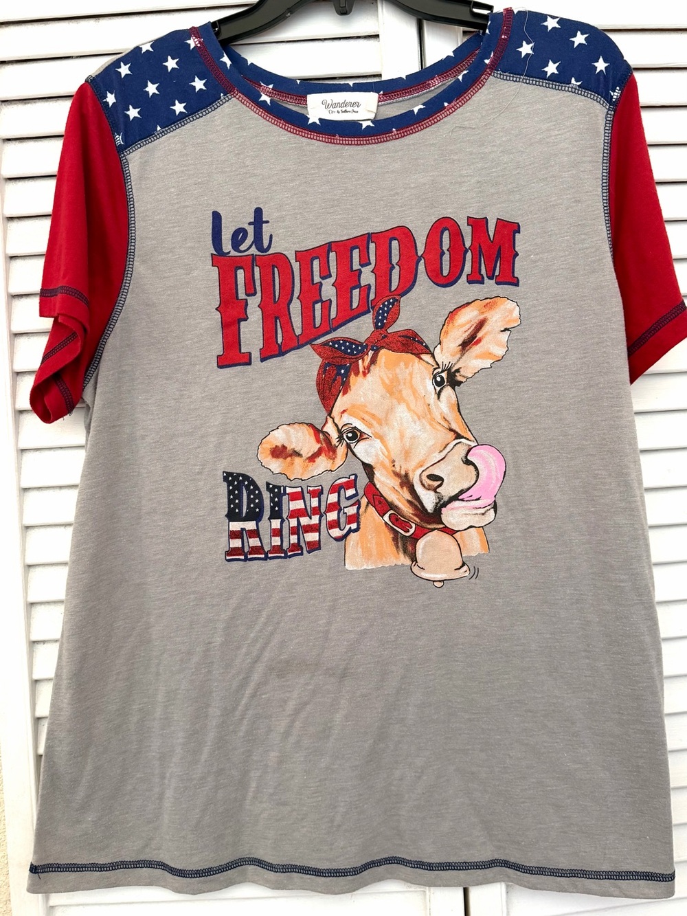 Southern Grace “Wanderer” patriotic chic cow let freedom ring